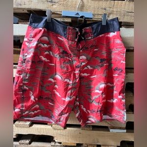 Quicksilver board shirts , sz 36. Hawaiian motif. Persimmon color